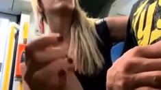 confident girlfriend gives nervous boyfriend blowjob on bus