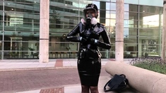 Latex gasmask exhibitionism