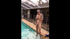 Married hunk jerks off over the pool while smoking