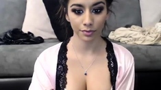 This brunette chick with nice big boobs and a pretty face is