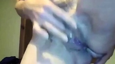 Moist MILF Pleasures Herself on Webcam