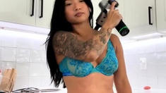 Busty Japanese babe in lingerie has her pussy licked out