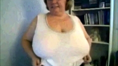 Mature Nancy playing with her boobs on webcam